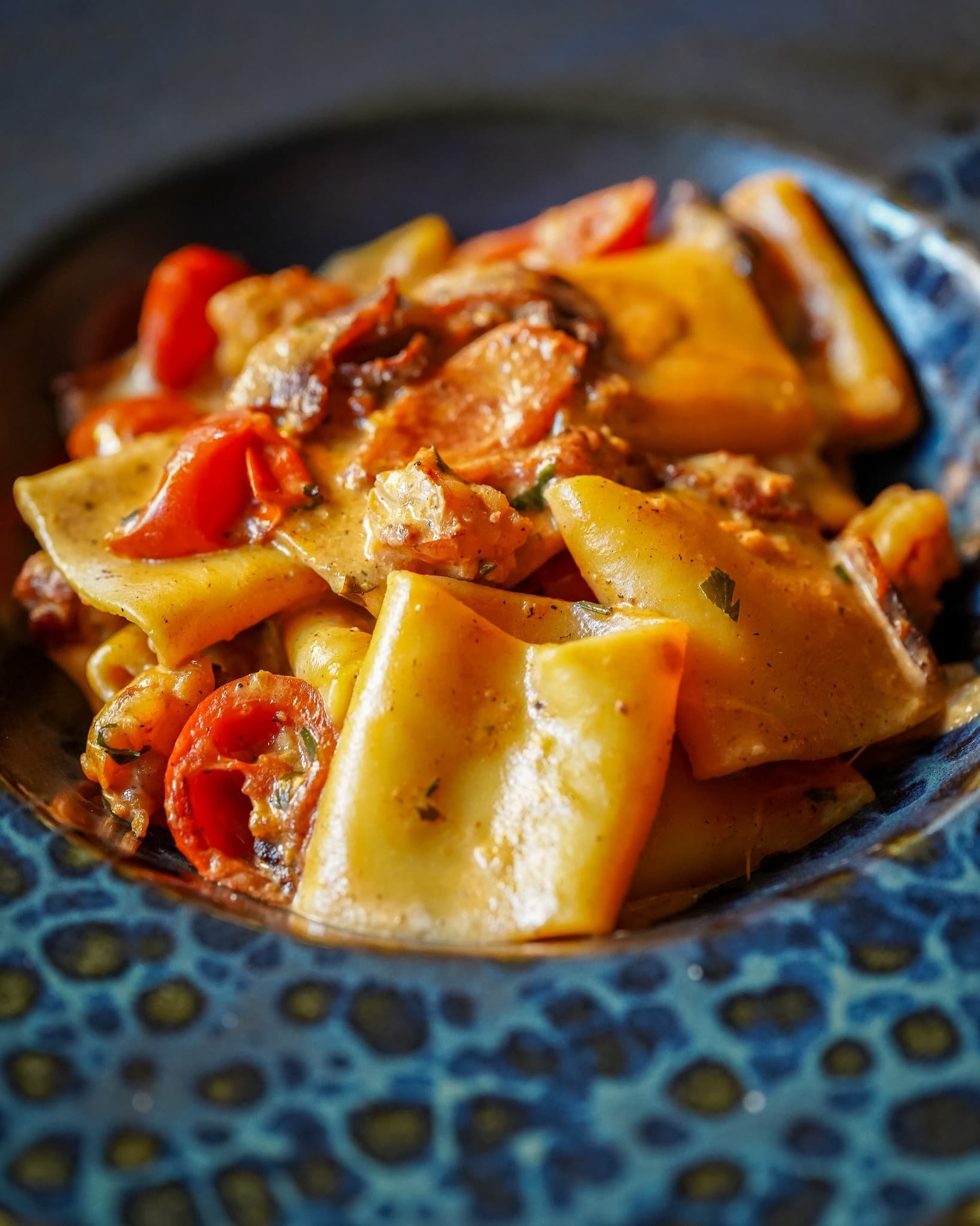 Paccheri with stracciatella, guanciale and prawns